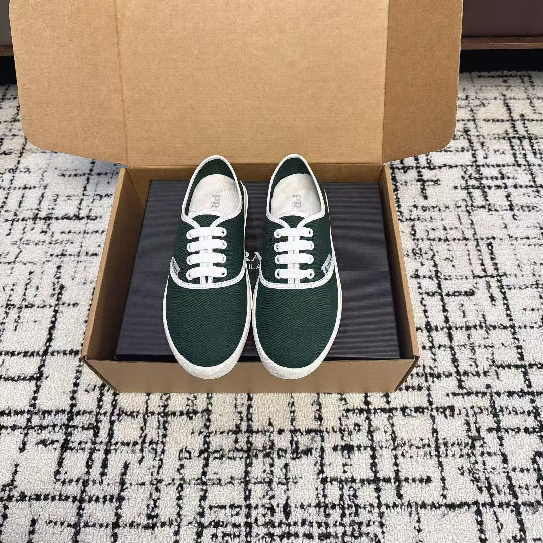 PRADA 26S LACE UP SNEAKERS IN DARK TEAL CANVAS