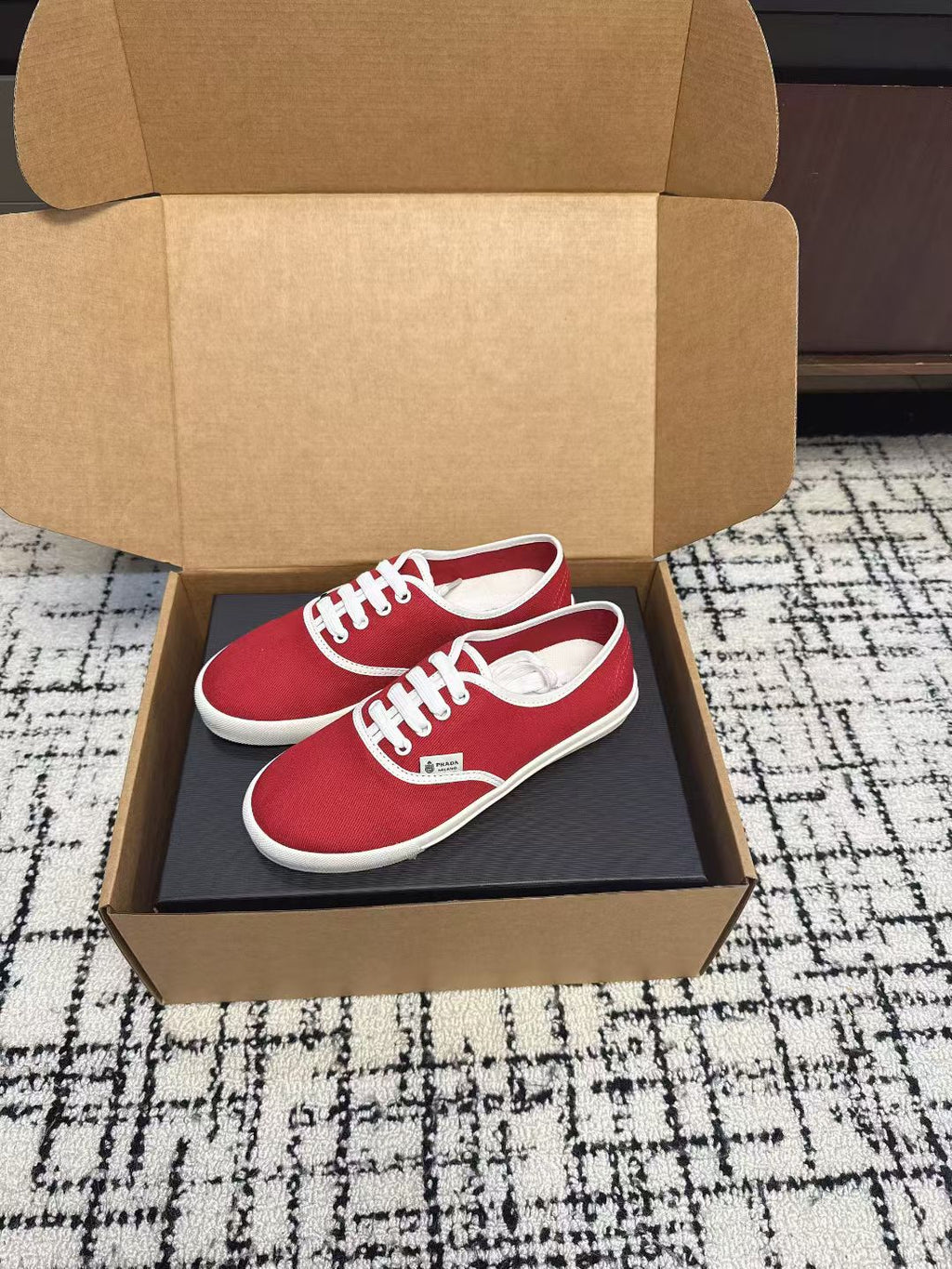 PRADA 26S LACE UP SNEAKERS IN RED CANVAS