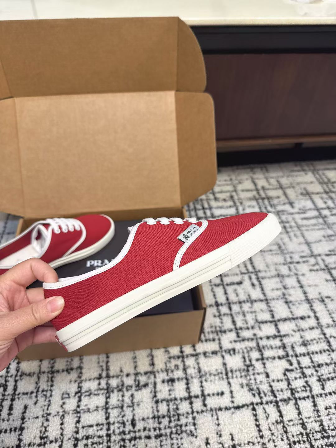 PRADA 26S LACE UP SNEAKERS IN RED CANVAS