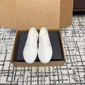 PRADA 26S LACE UP SNEAKERS IN WHITE CANVAS