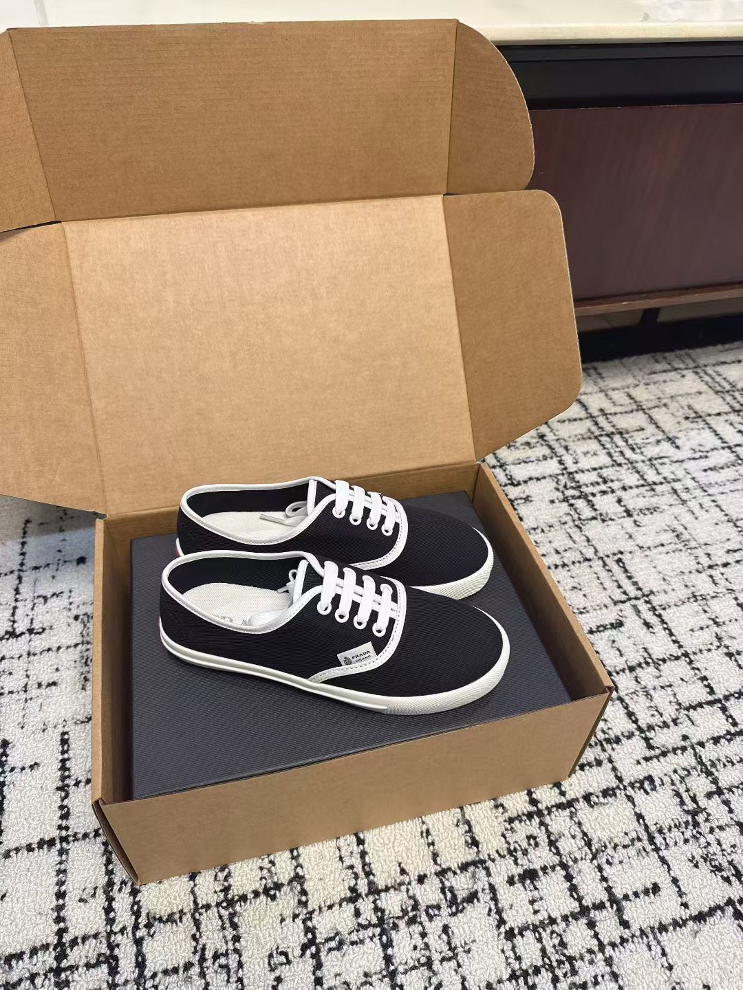 PRADA 26S LACE UP SNEAKERS IN BLACK AND WHITE CANVAS