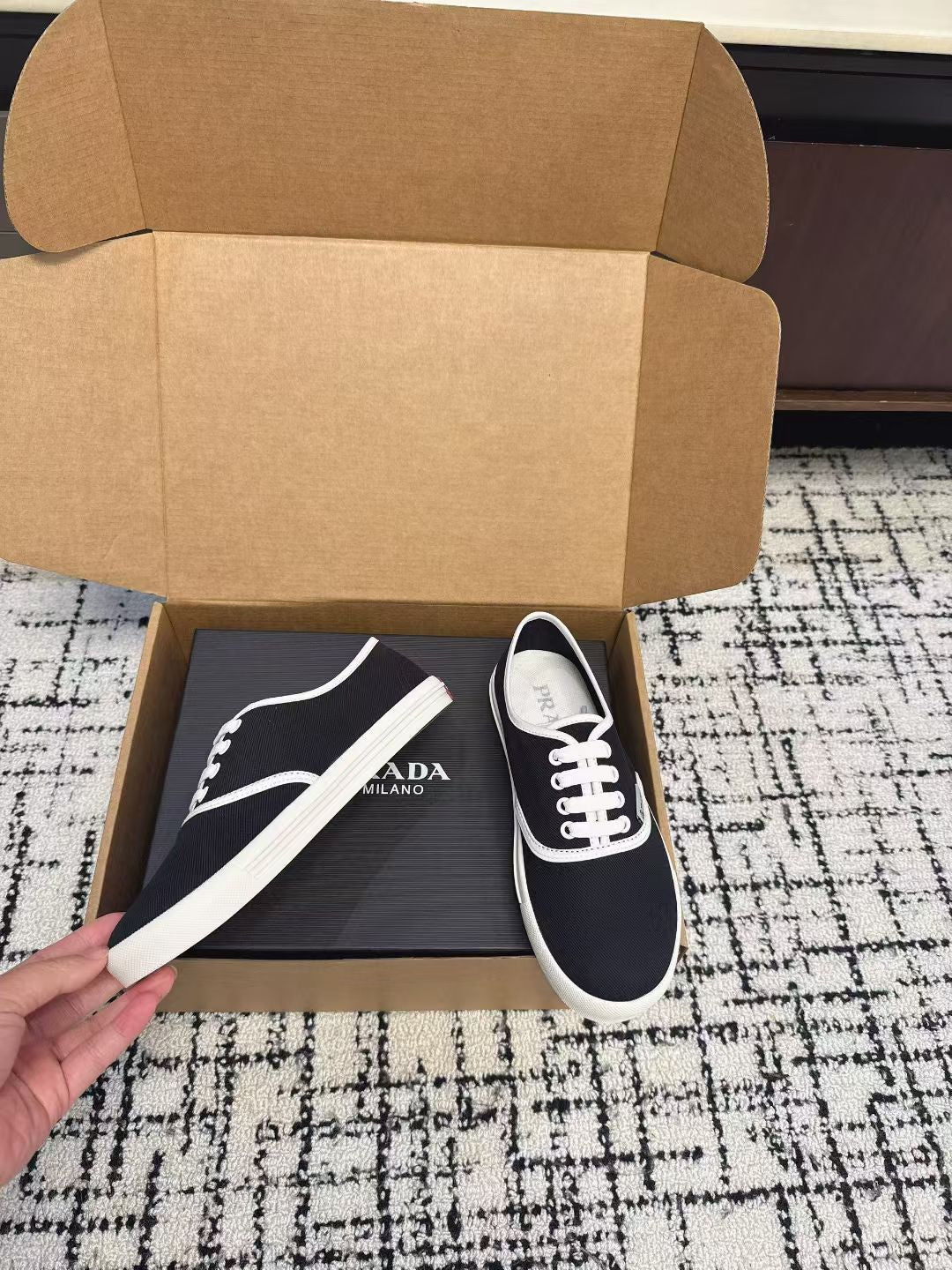 PRADA 26S LACE UP SNEAKERS IN BLACK AND WHITE CANVAS