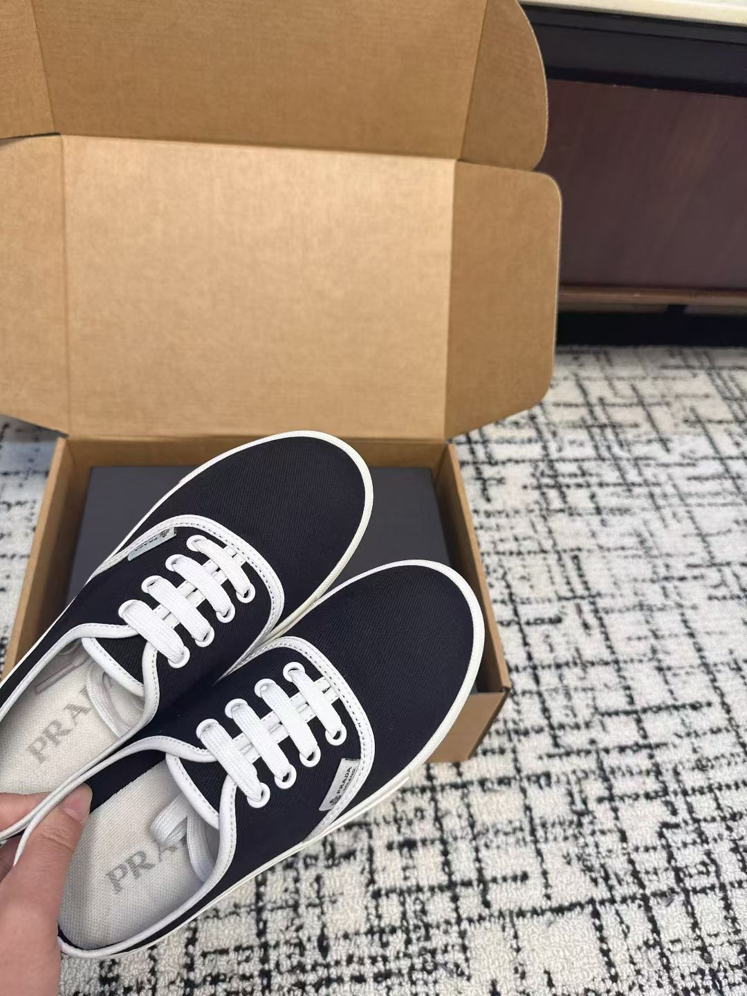 PRADA 26S LACE UP SNEAKERS IN BLACK AND WHITE CANVAS