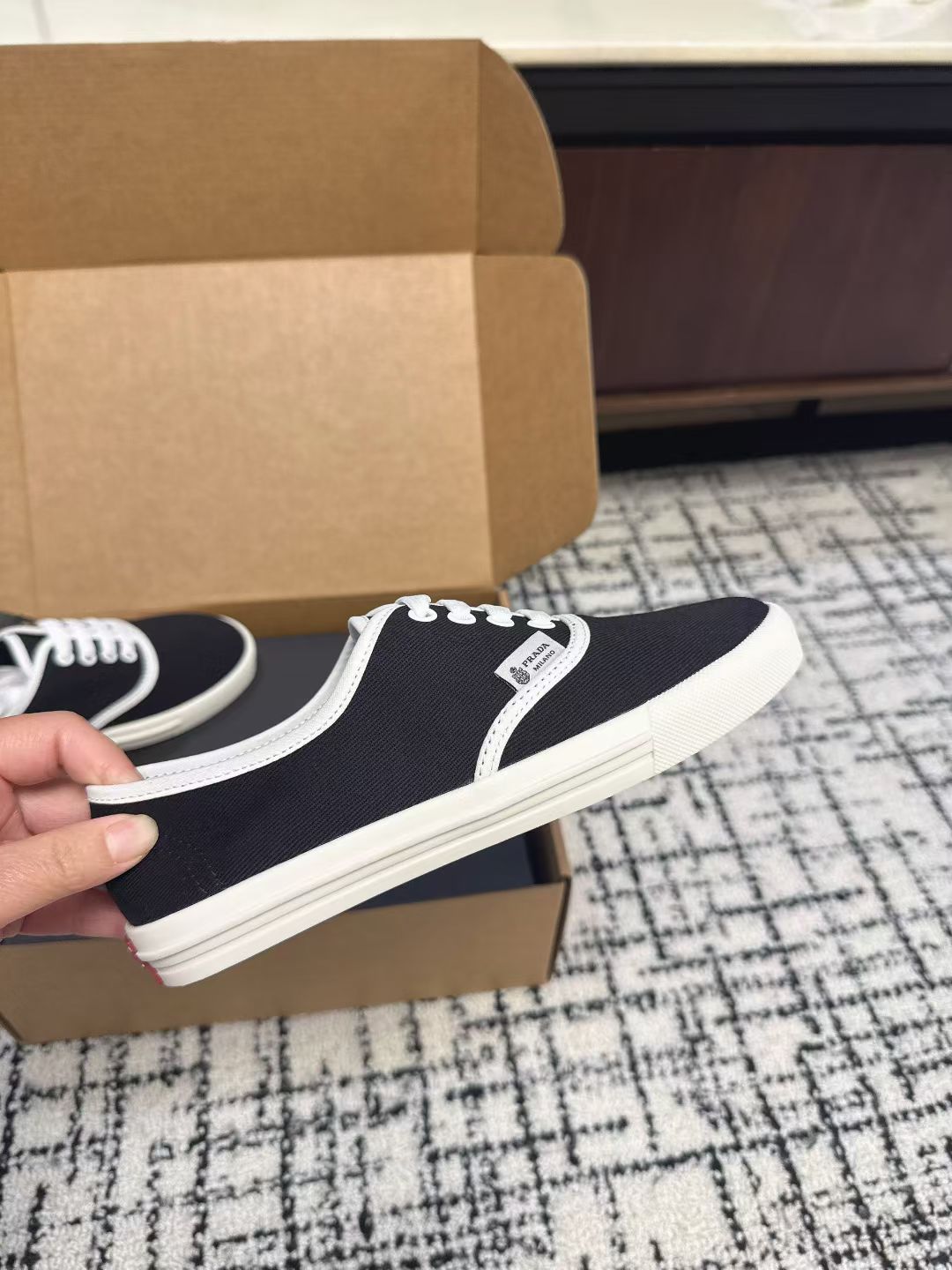 PRADA 26S LACE UP SNEAKERS IN BLACK AND WHITE CANVAS