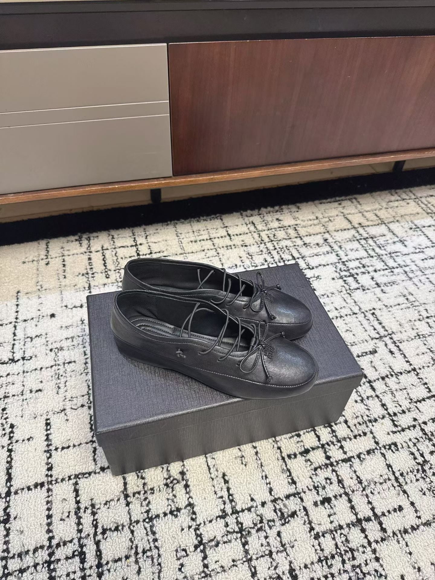 MIUMIU 26S LACE UP BOW LOAFERS IN BLACK CALFSKIN