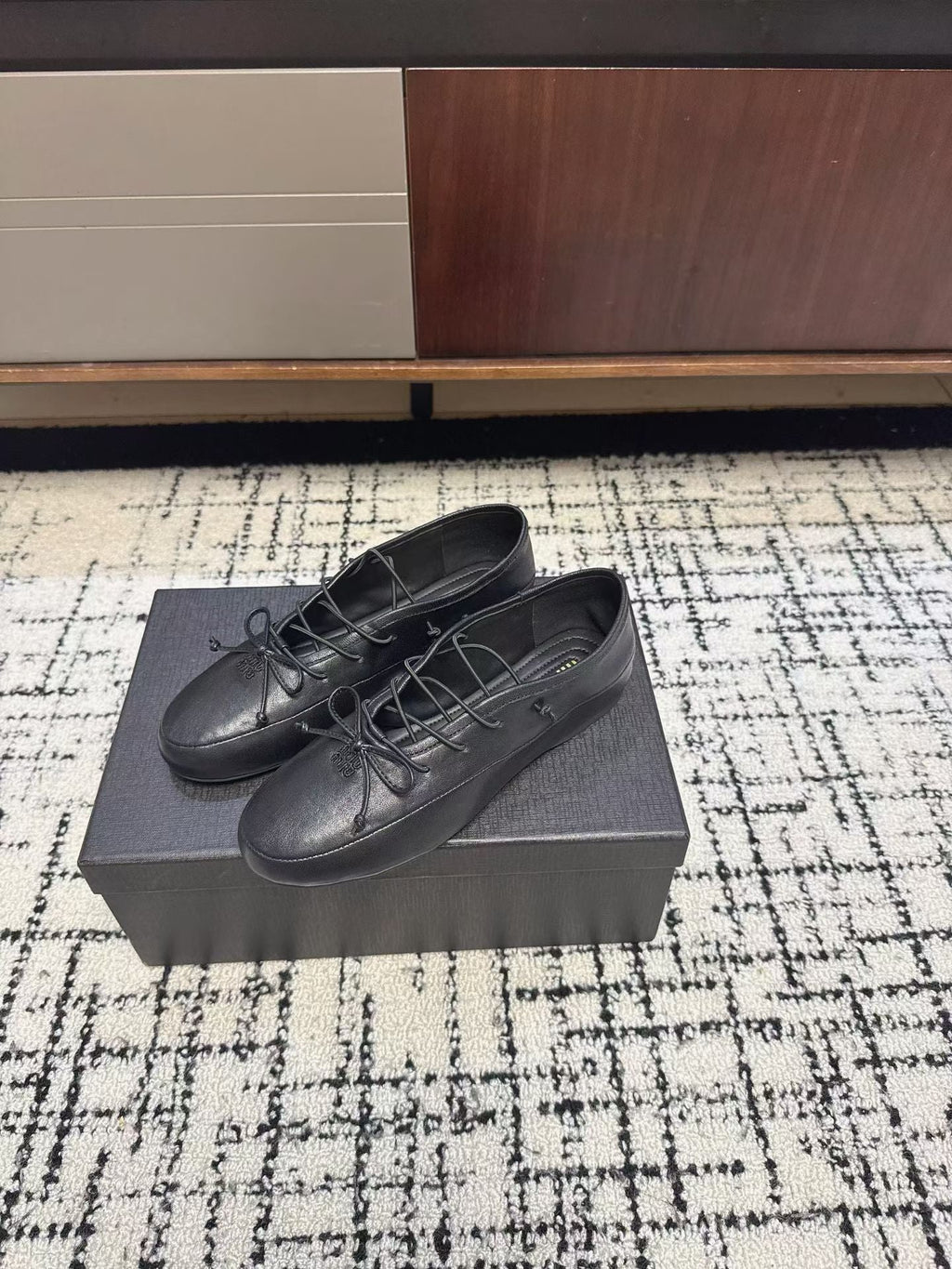 MIUMIU 26S LACE UP BOW LOAFERS IN BLACK CALFSKIN