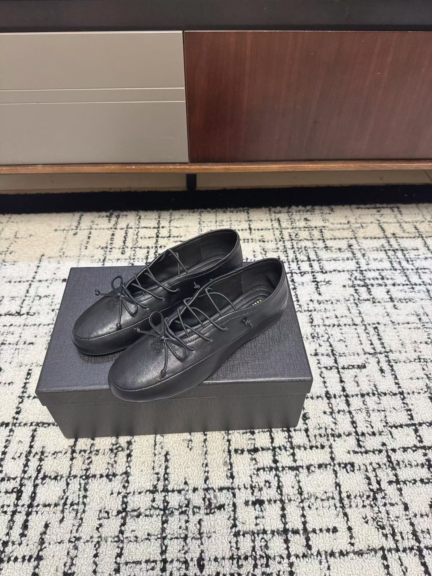 MIUMIU 26S LACE UP BOW LOAFERS IN BLACK CALFSKIN