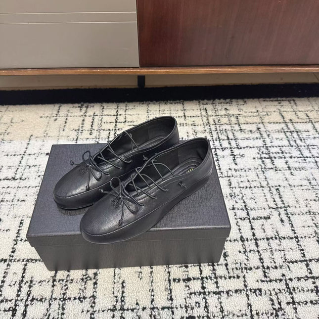 MIUMIU 26S LACE UP BOW LOAFERS IN BLACK CALFSKIN
