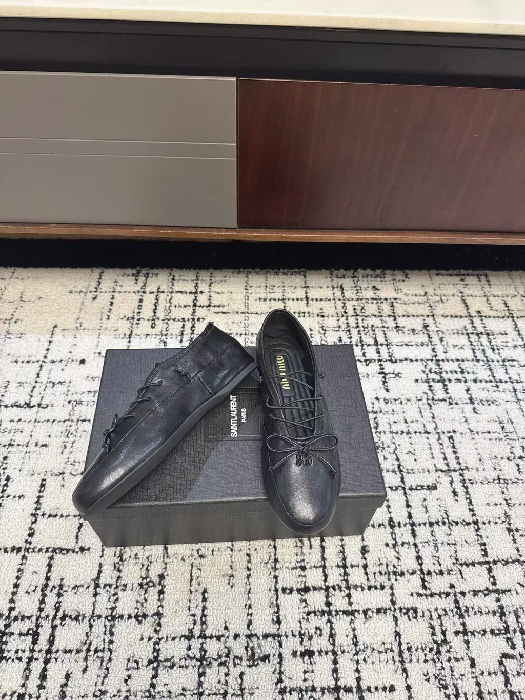 MIUMIU 26S LACE UP BOW LOAFERS IN BLACK CALFSKIN