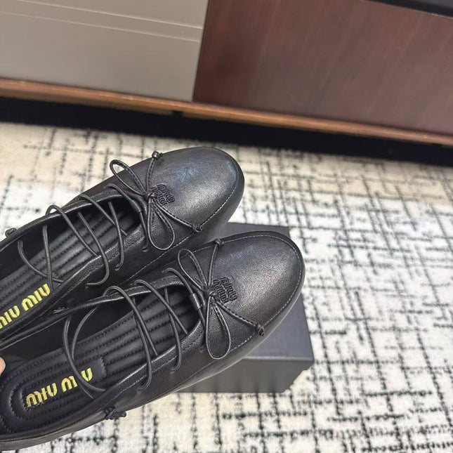 MIUMIU 26S LACE UP BOW LOAFERS IN BLACK CALFSKIN