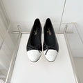 CHANEL 26S BALLET FLATS IN BLACK CRACKED CALFSKIN WITH WHITE TOE CAP AND BOW