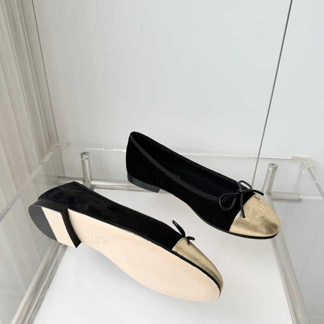 CHANEL 26S BALLET FLATS IN BLACK SUEDE WITH GOLD TOE CAP AND BOW