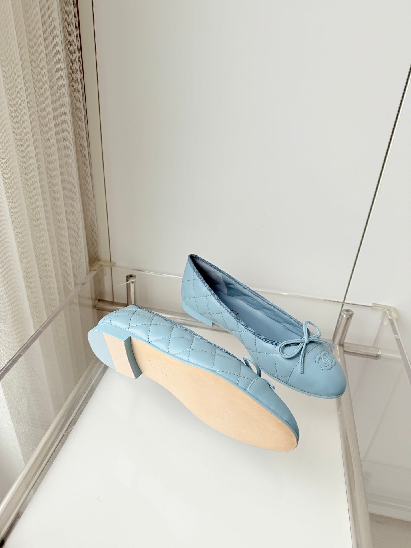 CHANEL 26S BALLET FLATS IN LIGHT BLUE QUILTED CALFSKIN WITH BOW