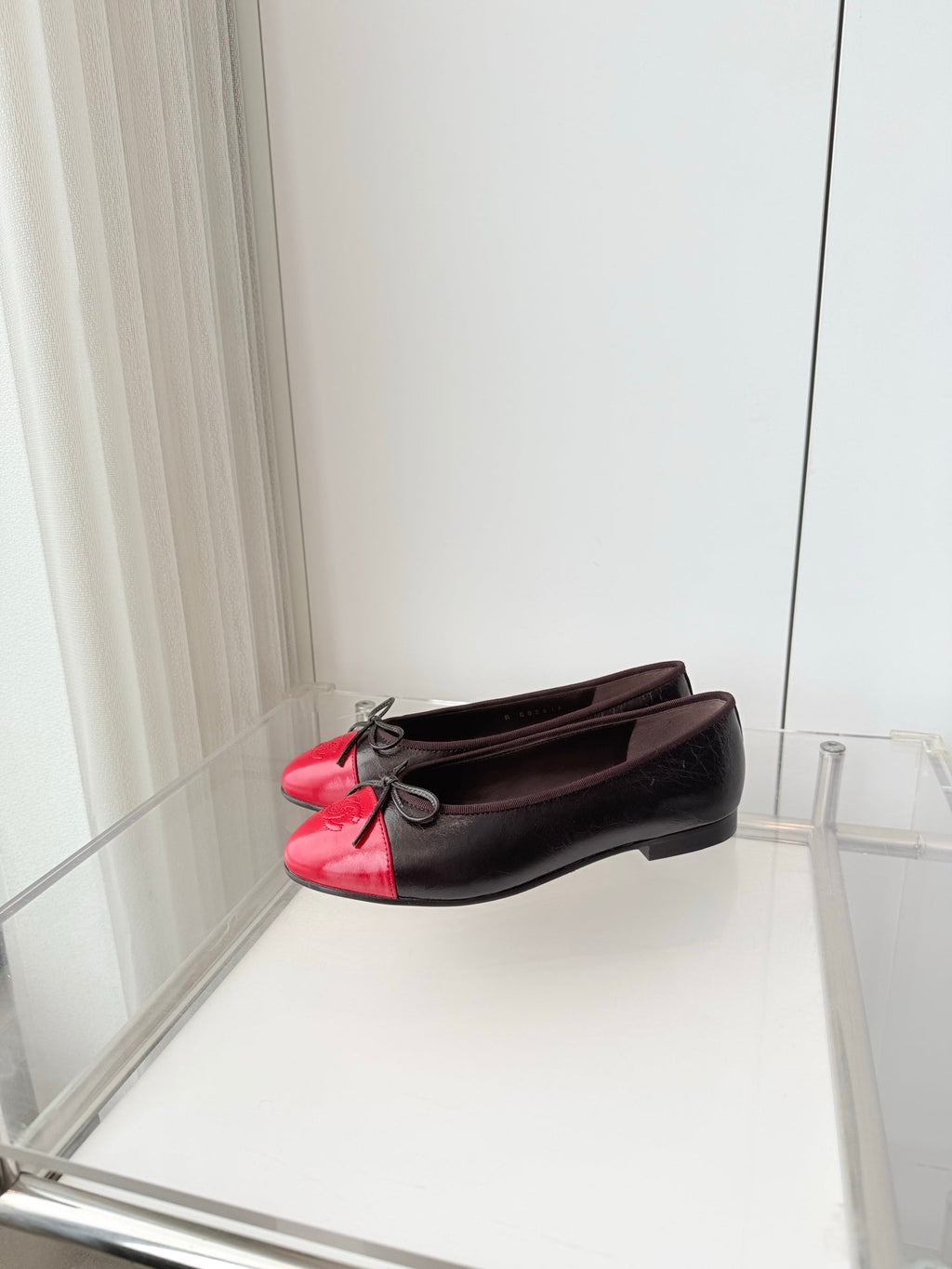 CHANEL 26S BALLET FLATS IN DARK BROWN CALFSKIN WITH RED PATENT TOE CAP & BOW