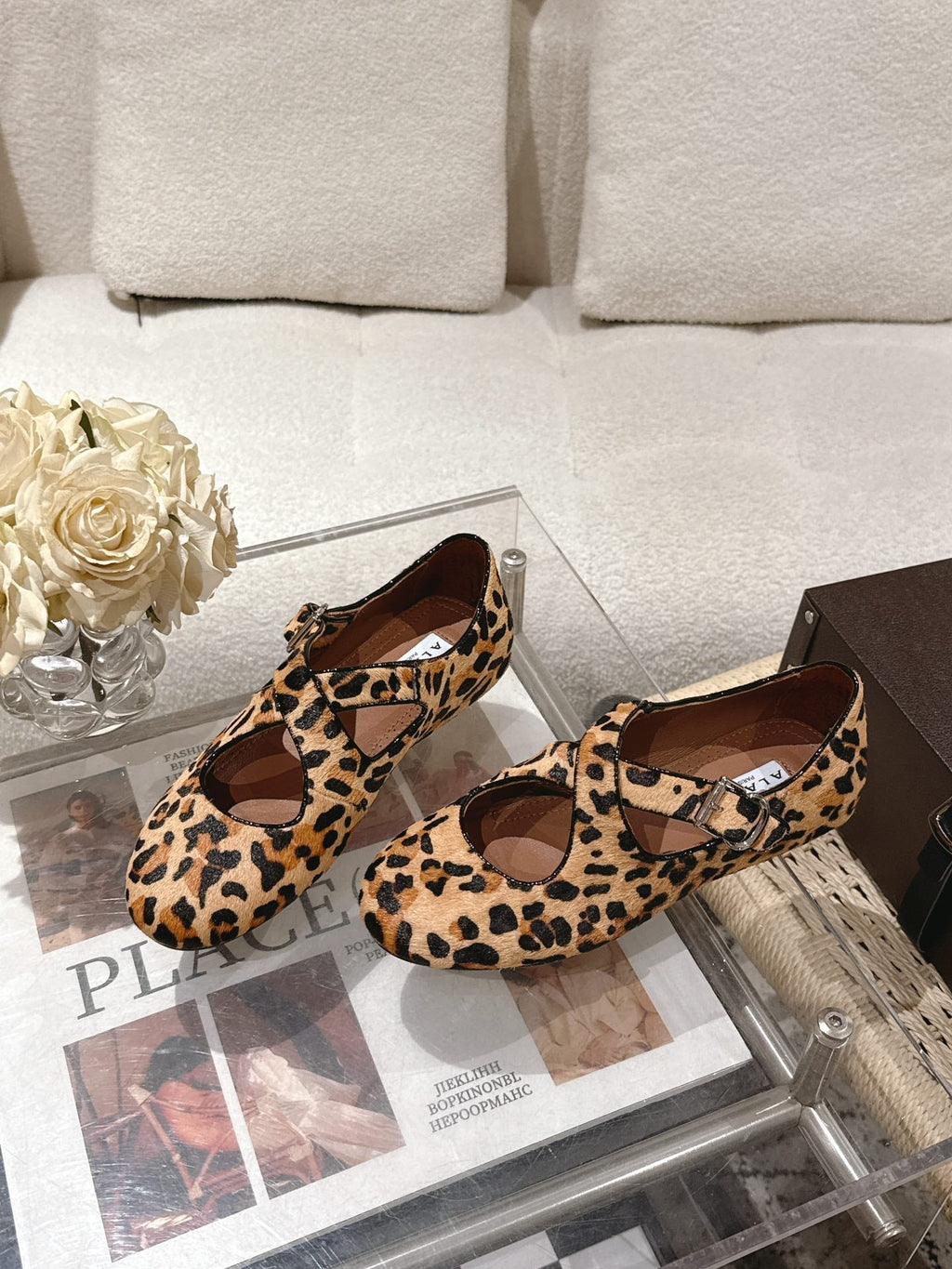 ALAIA 25S CRISS CROSS BALLET FLATS IN LEOPARD SUEDE