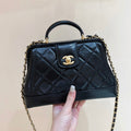 MEDIUM TOP HANDLE BAG 23 IN BLACK OIL-WAX LAMBSKIN GOLD HARDWARE