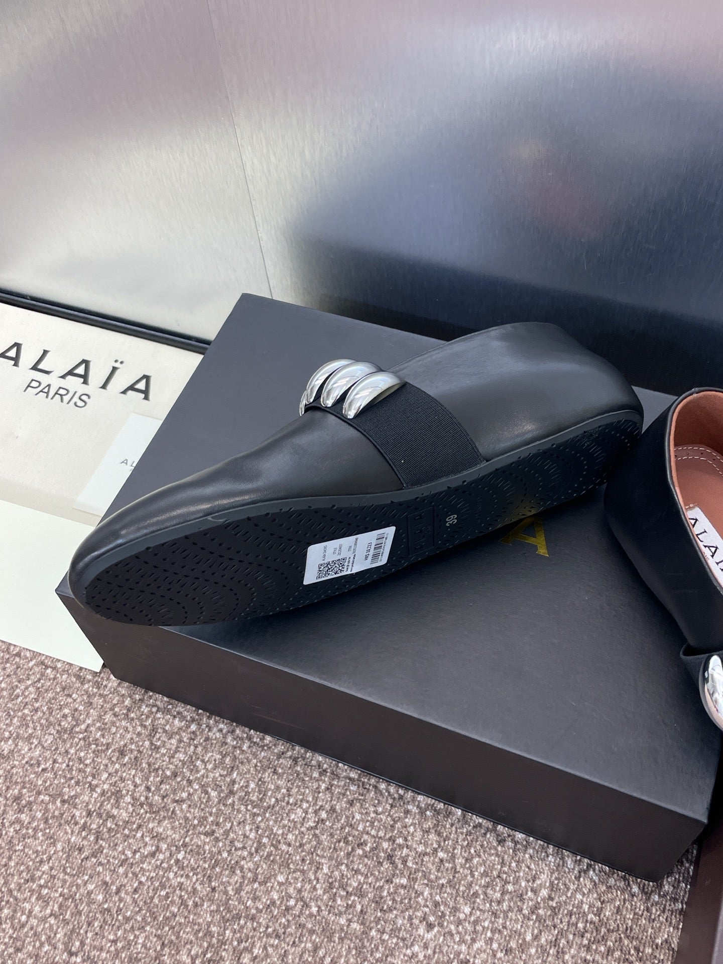 ALAIA MARY JANE FLATS 25S IN BLACK CALFSKIN WITH SILVER HARDWARE