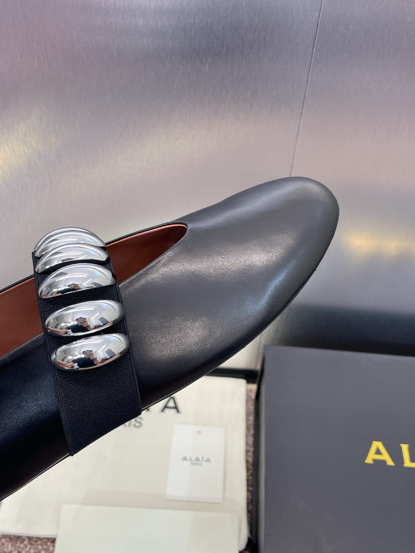 ALAIA MARY JANE FLATS 25S IN BLACK CALFSKIN WITH SILVER HARDWARE