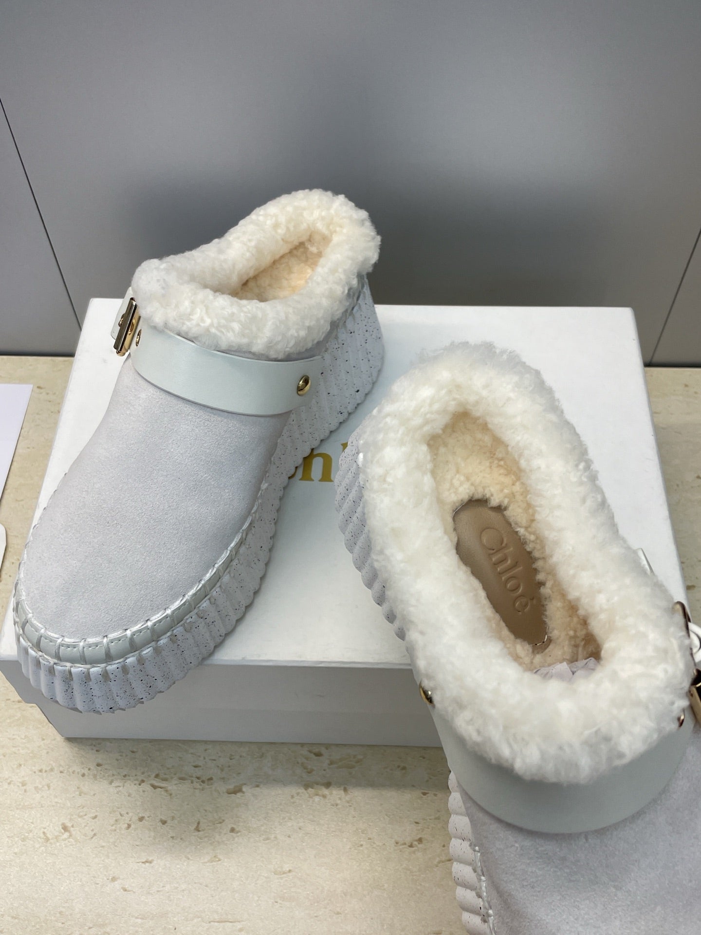 CHLOÉ 26S FUR-LINED WEDGE MULES IN LIGHT GREY SUEDE