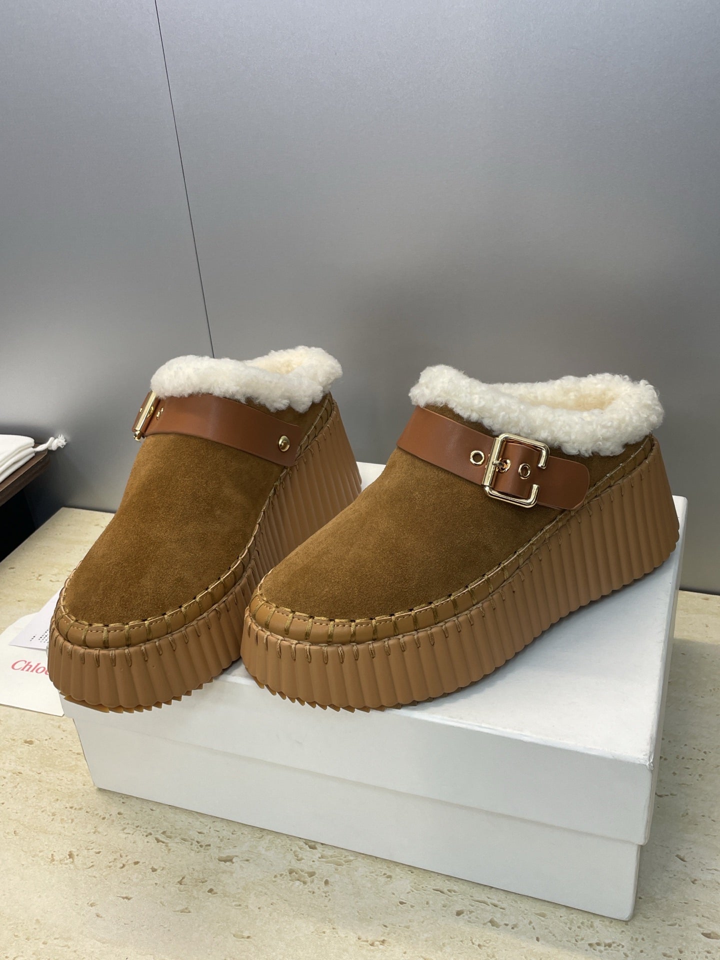 CHLOÉ 26S FUR-LINED WEDGE MULES IN BROWN SUEDE