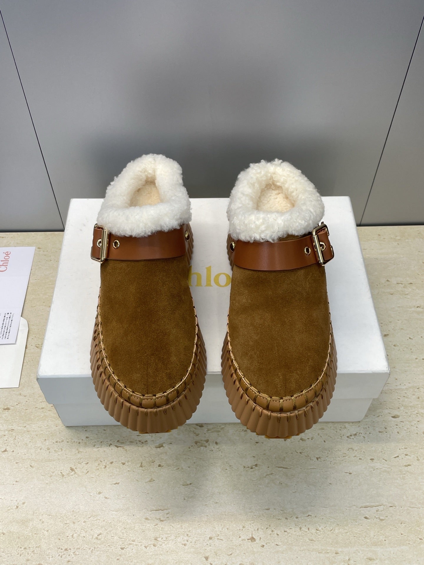CHLOÉ 26S FUR-LINED WEDGE MULES IN BROWN SUEDE