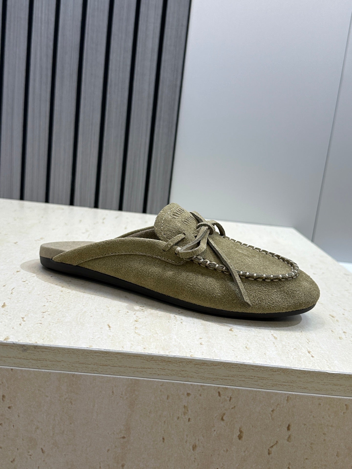 MIUMIU 26S SNEAKER MULES IN DARK OLIVE GREEN SUEDE WITH BOW