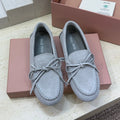 MIUMIU 26S LOAFERS IN LIGHT BLUE SUEDE WITH BOW