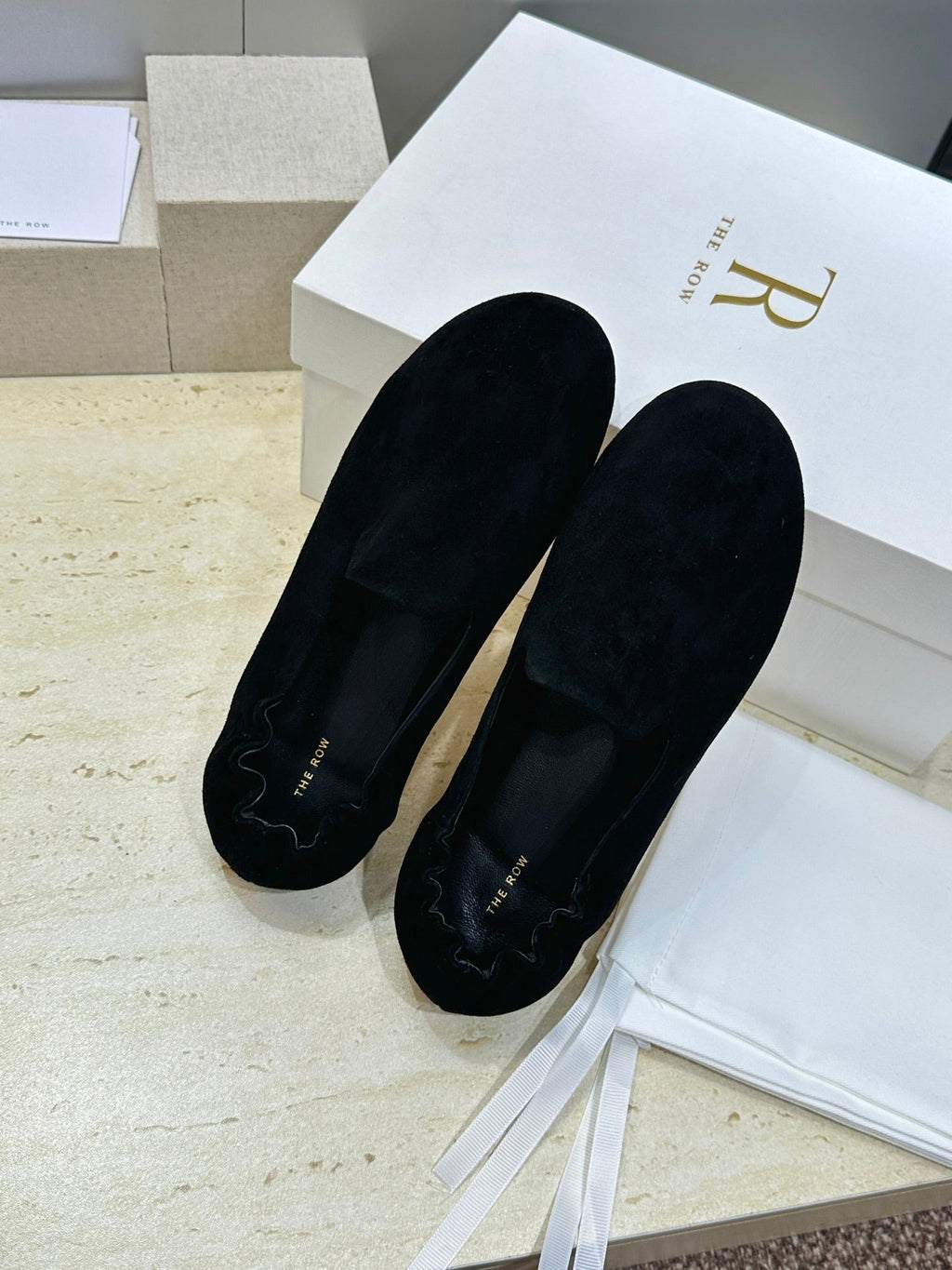 THE ROW 26S BALLET FLATS IN BLACK SUEDE