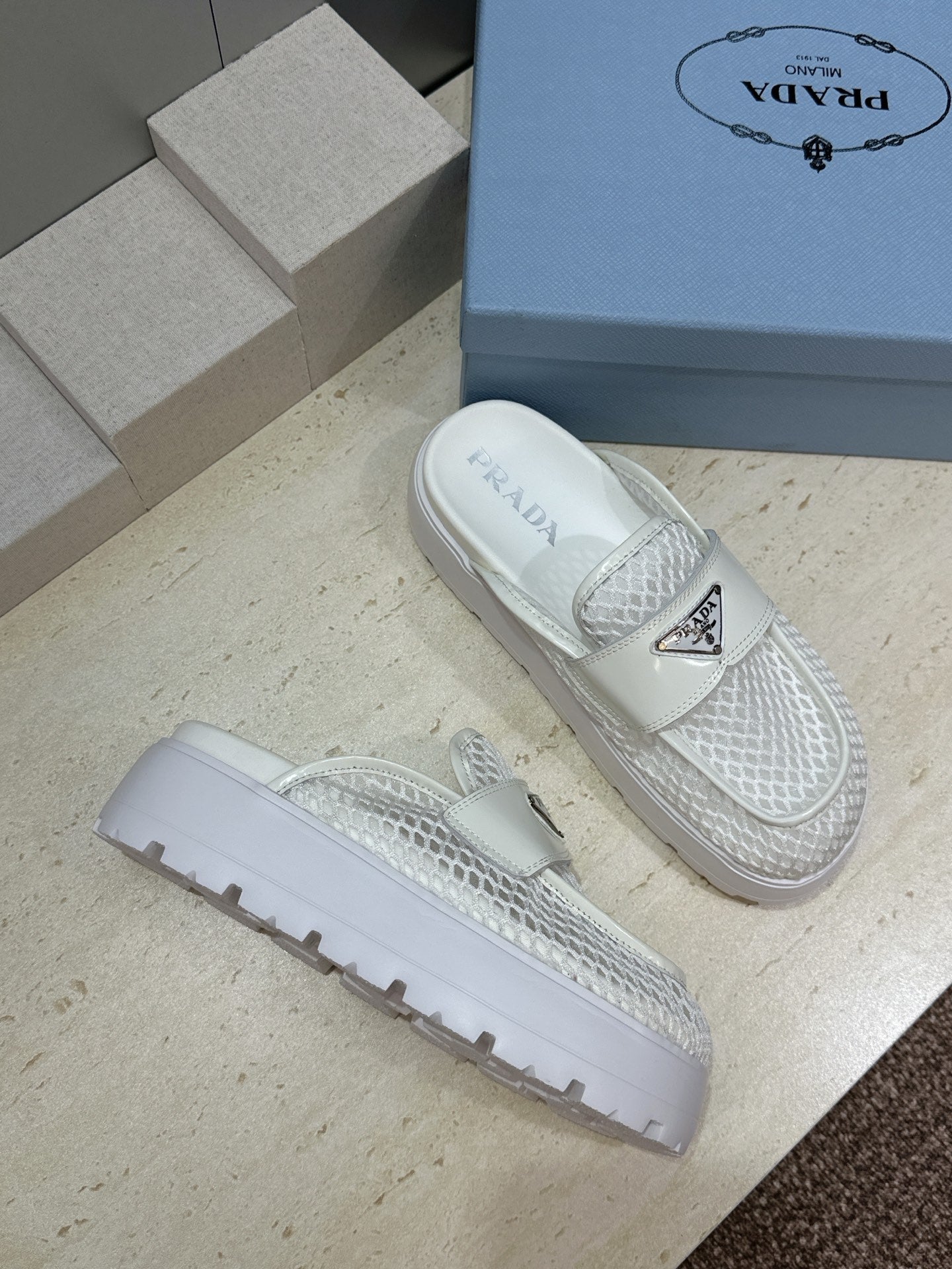 PRADA 26S MULE LOAFERS IN WHITE MESH AND CALFSKIN