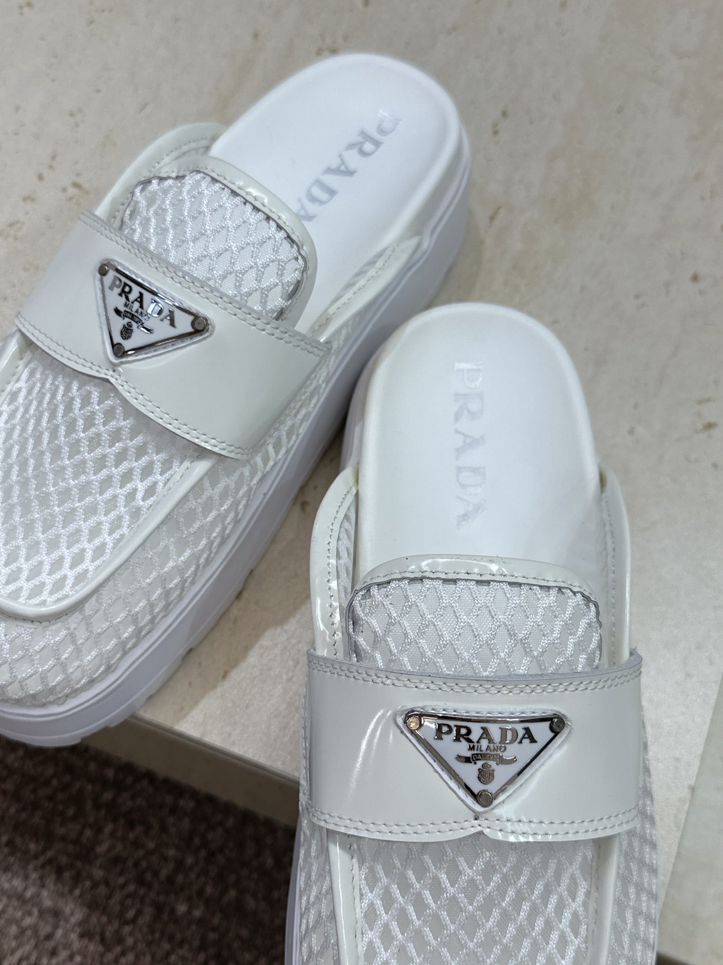 PRADA 26S MULE LOAFERS IN WHITE MESH AND CALFSKIN