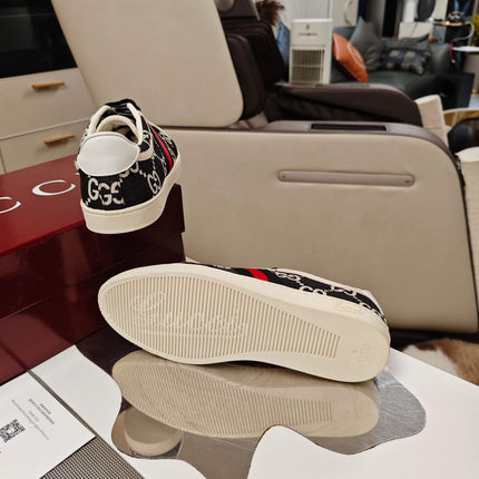 GUCCI 26S GG WEB SNEAKERS IN BLACK AND WHITE GG CANVAS
