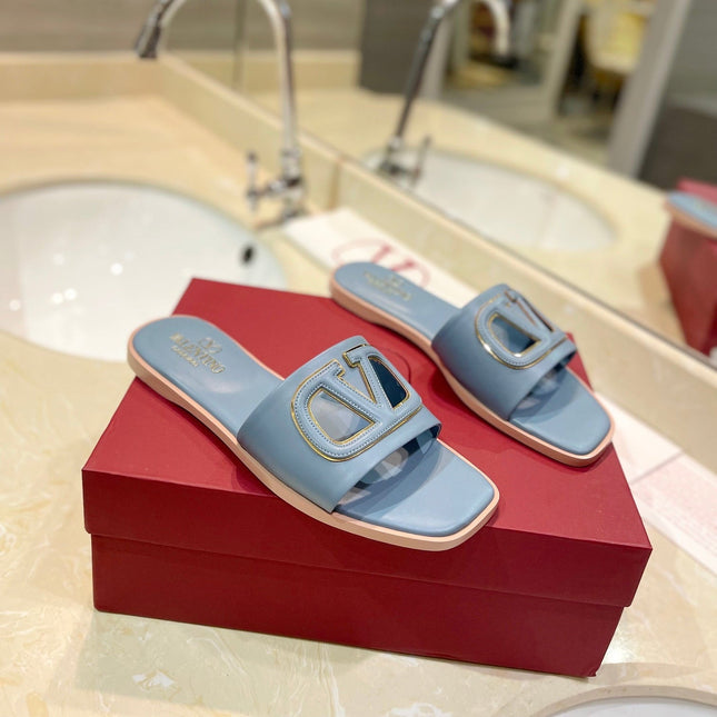 VALENTINO 26S SLIDES IN PASTEL BLUE CALFSKIN WITH LOGO