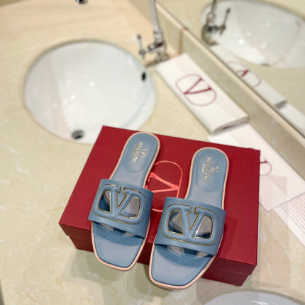 VALENTINO 26S SLIDES IN PASTEL BLUE CALFSKIN WITH LOGO
