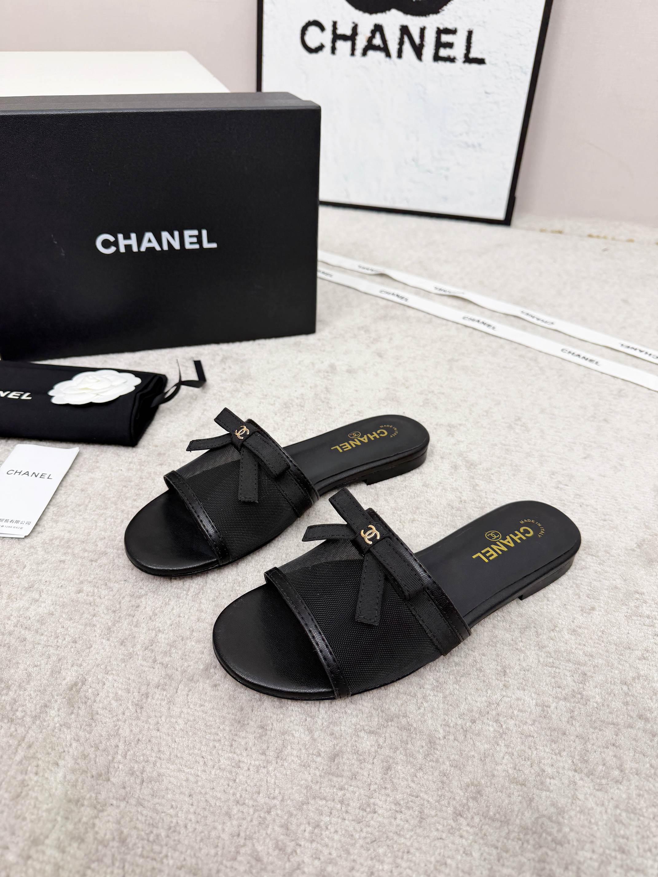 CHANEL 26S SLIDE SANDALS IN BLACK MESH AND CALFSKIN WITH RIBBON