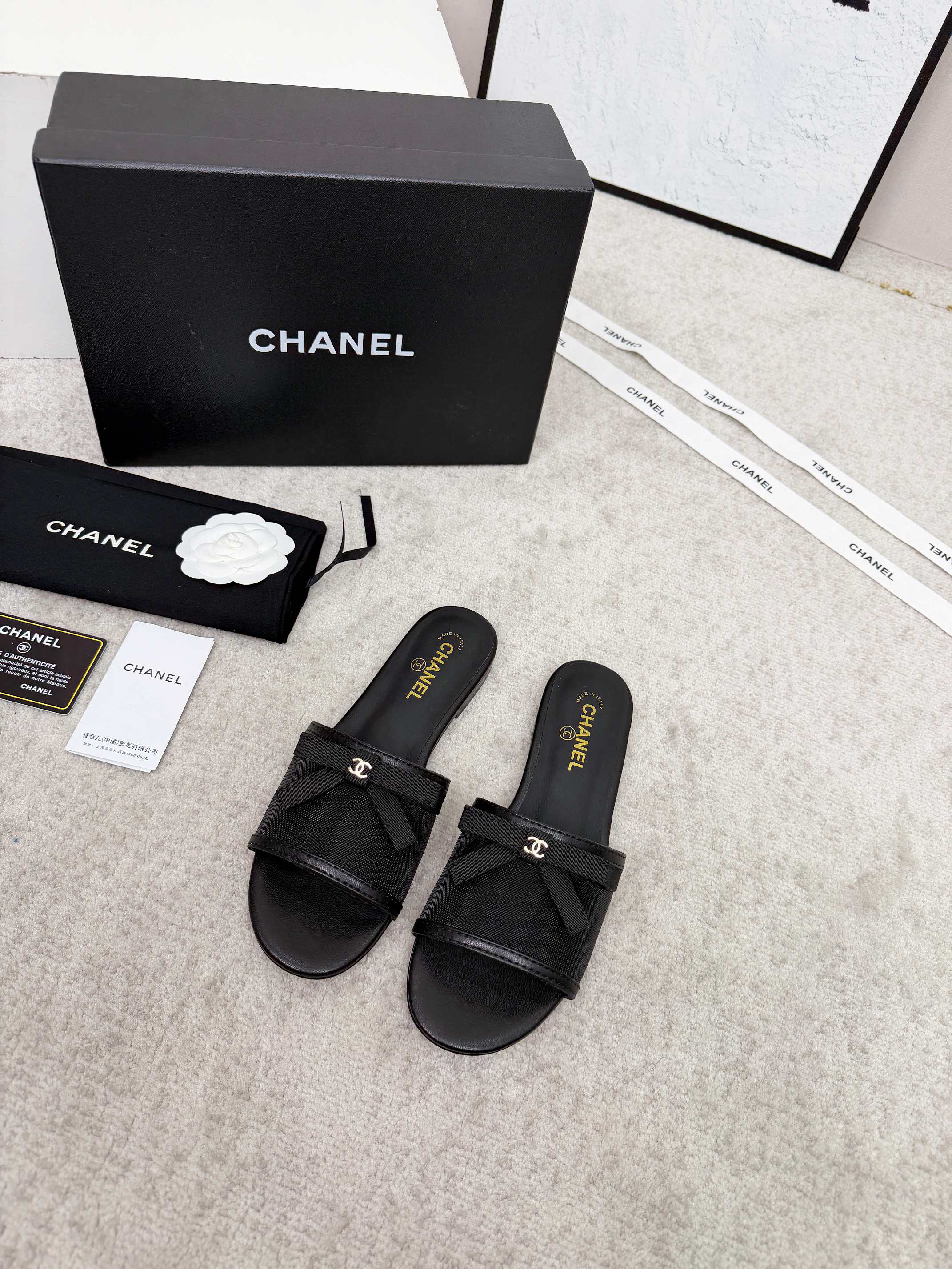 CHANEL 26S SLIDE SANDALS IN BLACK MESH AND CALFSKIN WITH RIBBON