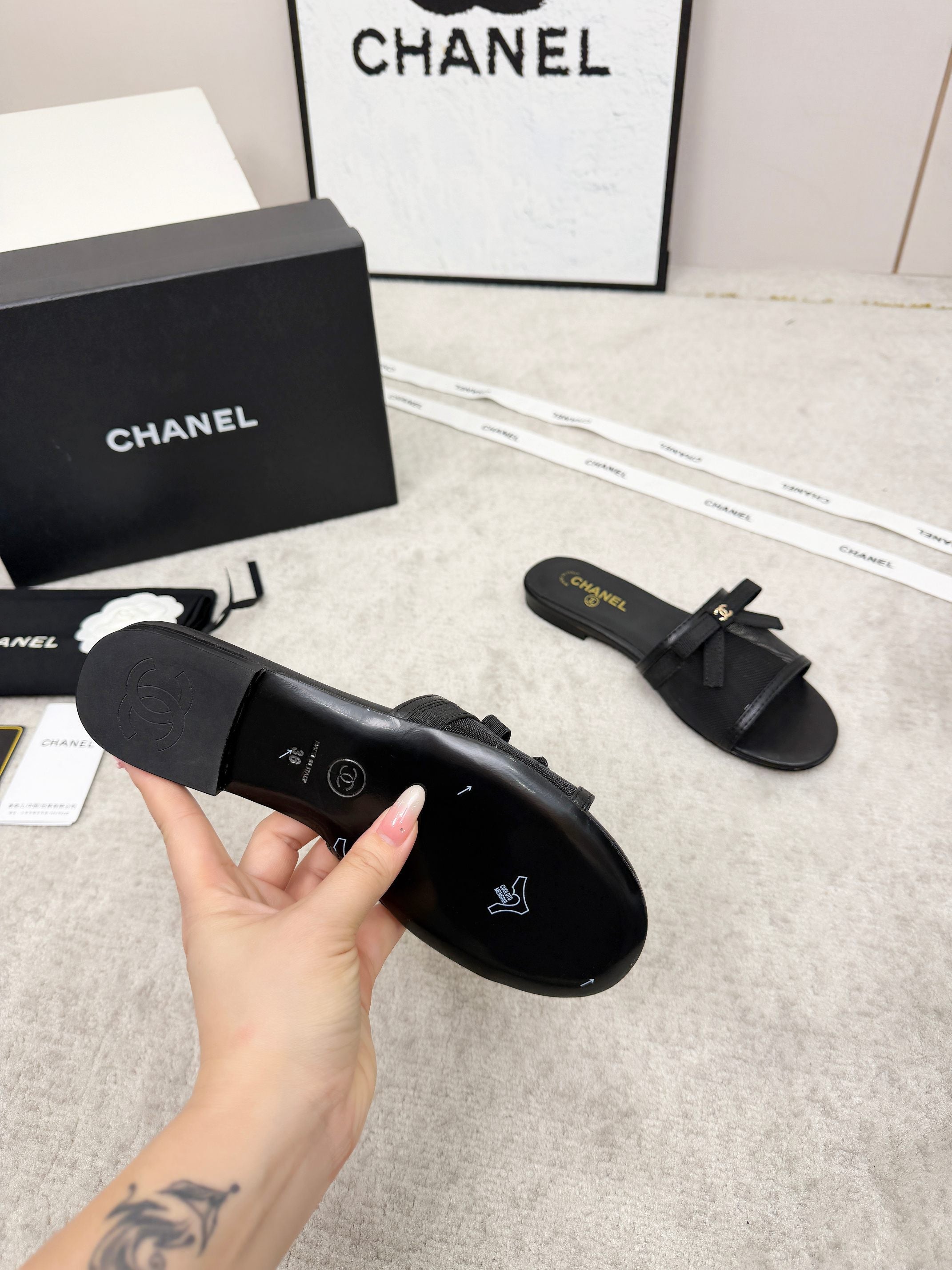 CHANEL 26S SLIDE SANDALS IN BLACK MESH AND CALFSKIN WITH RIBBON