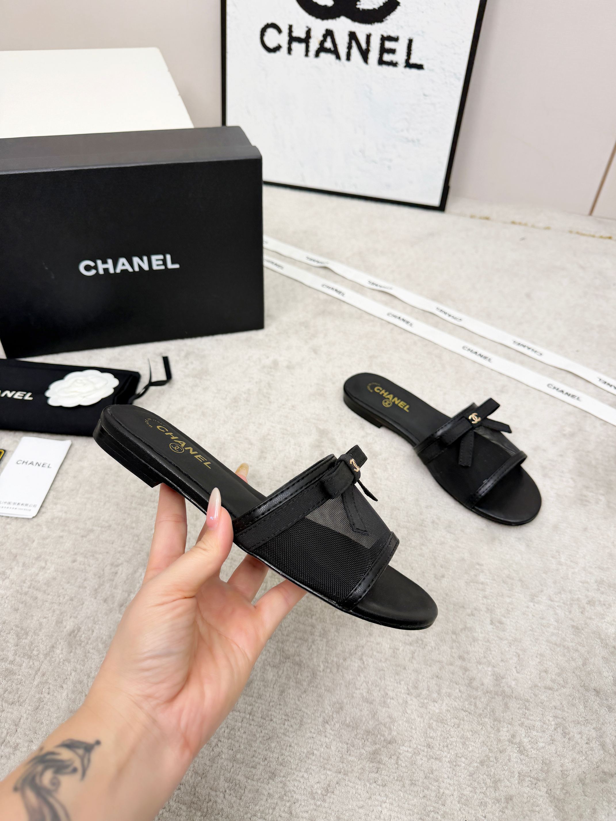 CHANEL 26S SLIDE SANDALS IN BLACK MESH AND CALFSKIN WITH RIBBON