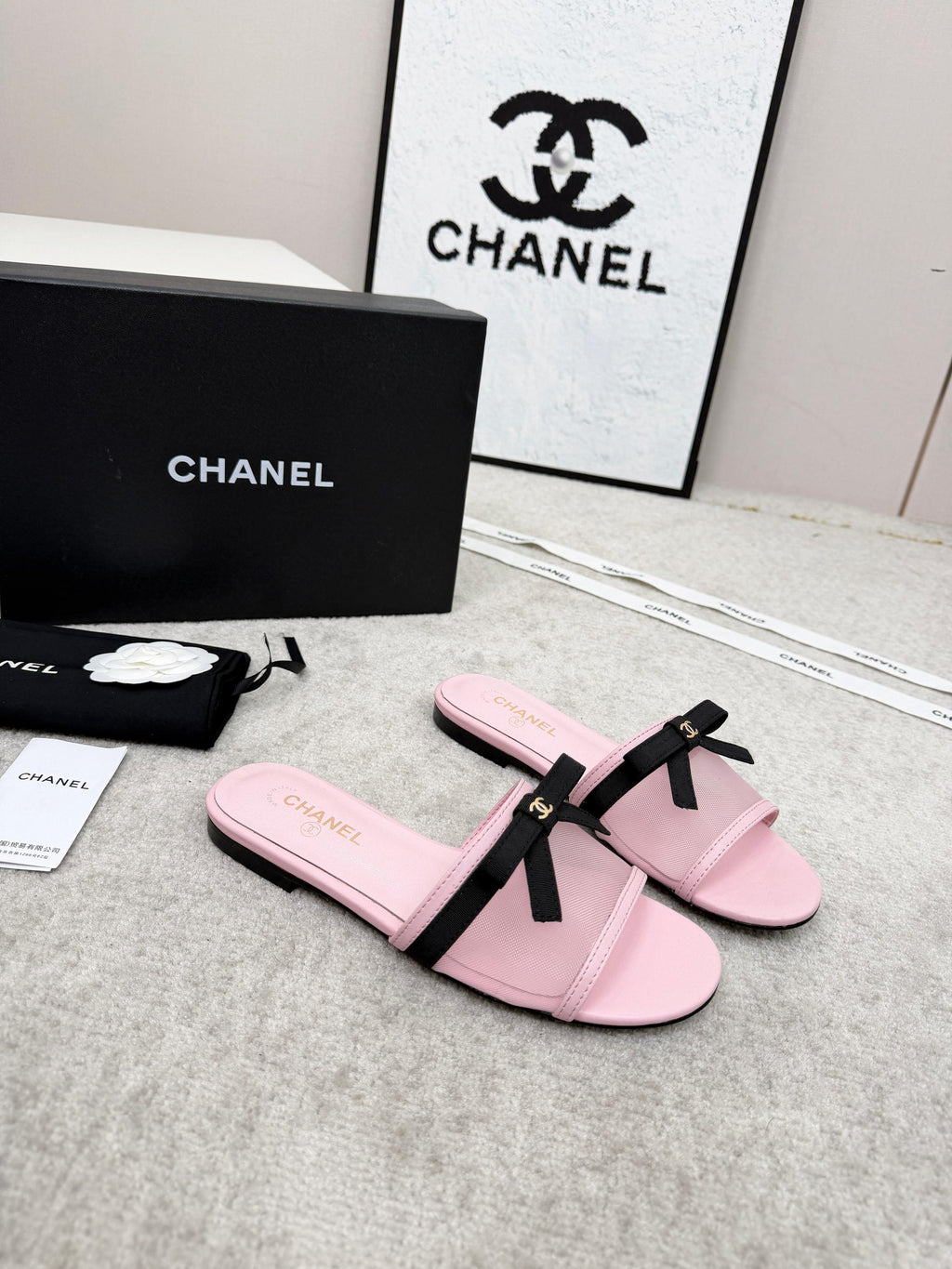 CHANEL 26S SLIDE SANDALS IN PINK MESH AND CALFSKIN WITH BLACK RIBBON