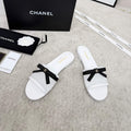 CHANEL 26S SLIDE SANDALS IN WHITE MESH AND CALFSKIN WITH BLACK RIBBON
