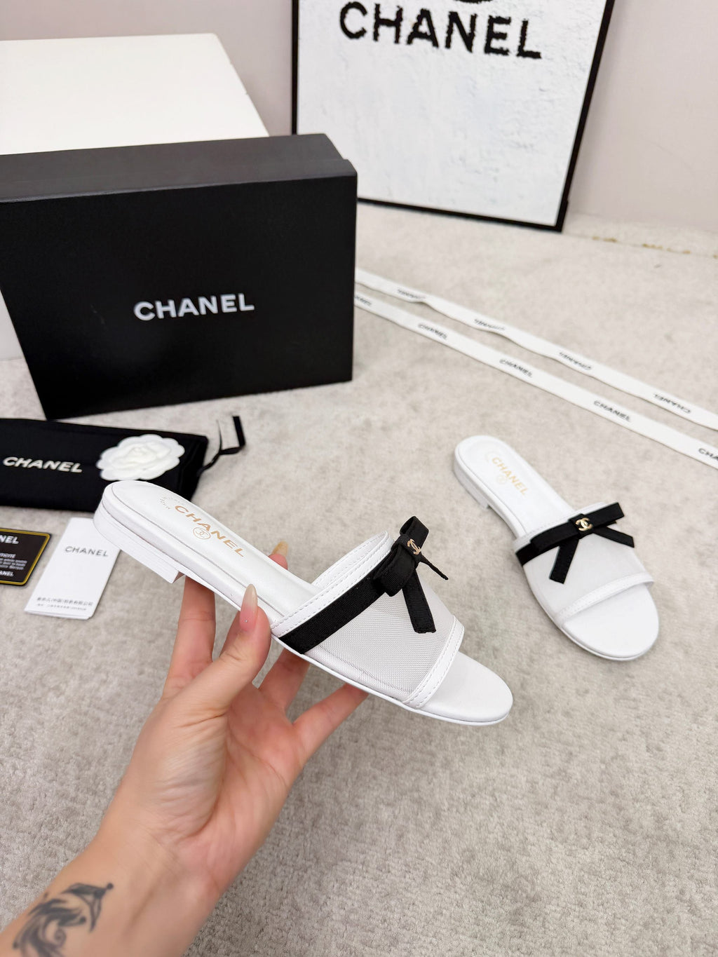 CHANEL 26S SLIDE SANDALS IN WHITE MESH AND CALFSKIN WITH BLACK RIBBON
