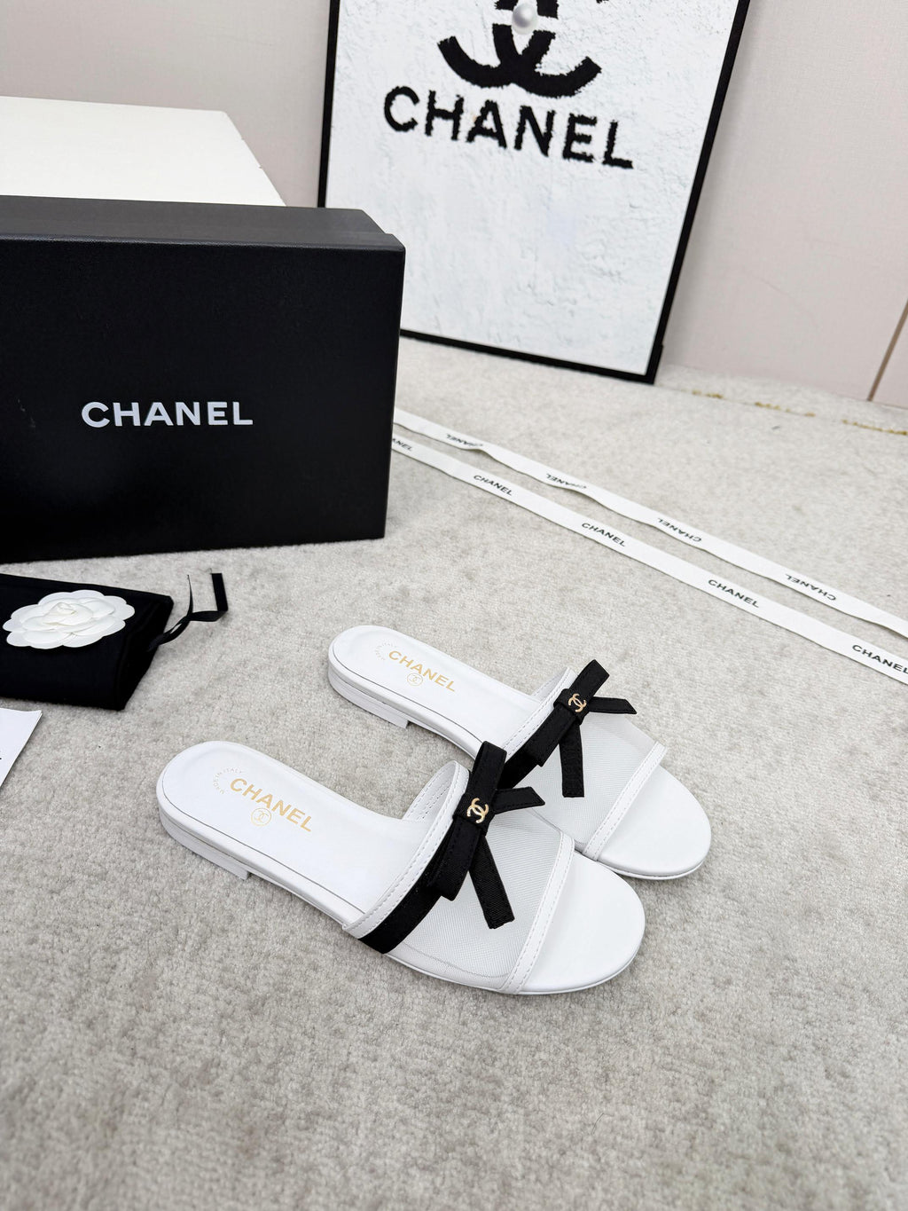 CHANEL 26S SLIDE SANDALS IN WHITE MESH AND CALFSKIN WITH BLACK RIBBON