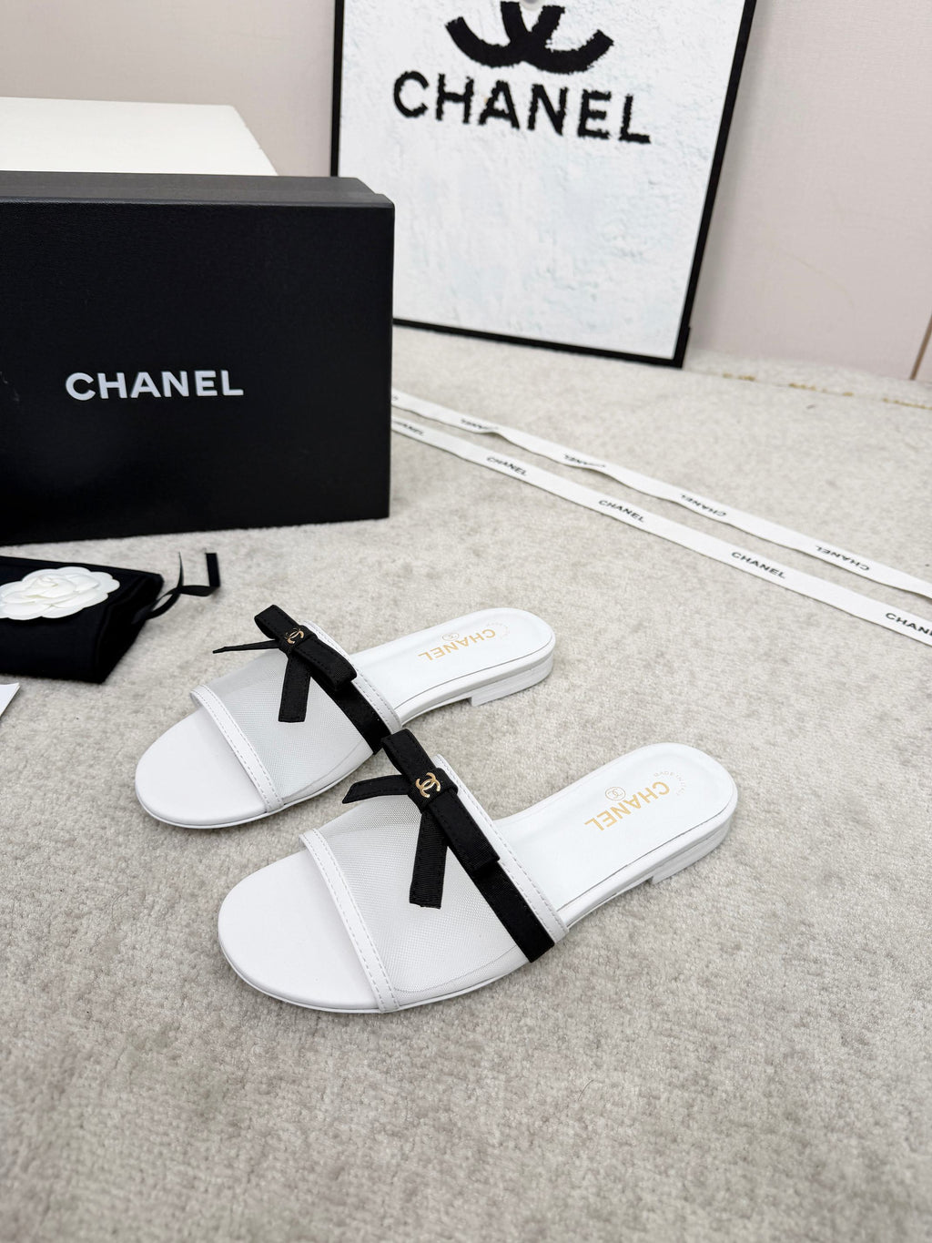 CHANEL 26S SLIDE SANDALS IN WHITE MESH AND CALFSKIN WITH BLACK RIBBON
