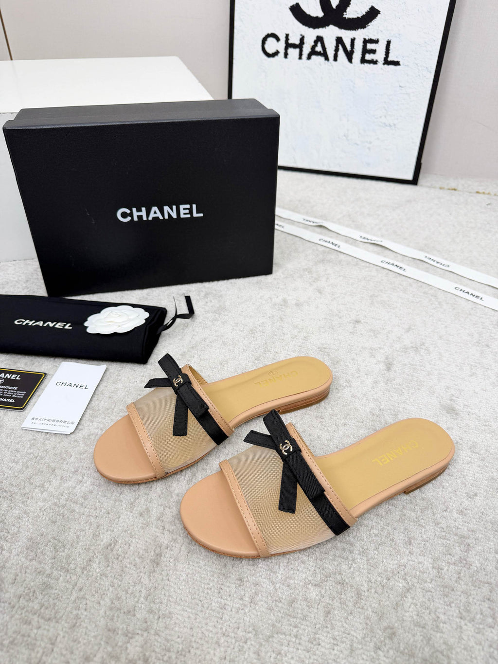 CHANEL 26S SLIDE SANDALS IN BEIGE MESH AND CALFSKIN WITH BLACK RIBBON