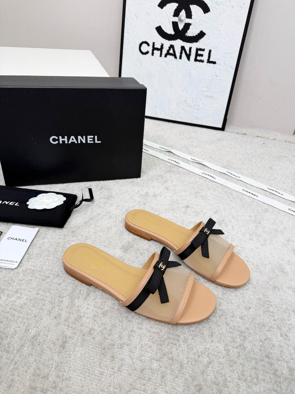 CHANEL 26S SLIDE SANDALS IN BEIGE MESH AND CALFSKIN WITH BLACK RIBBON
