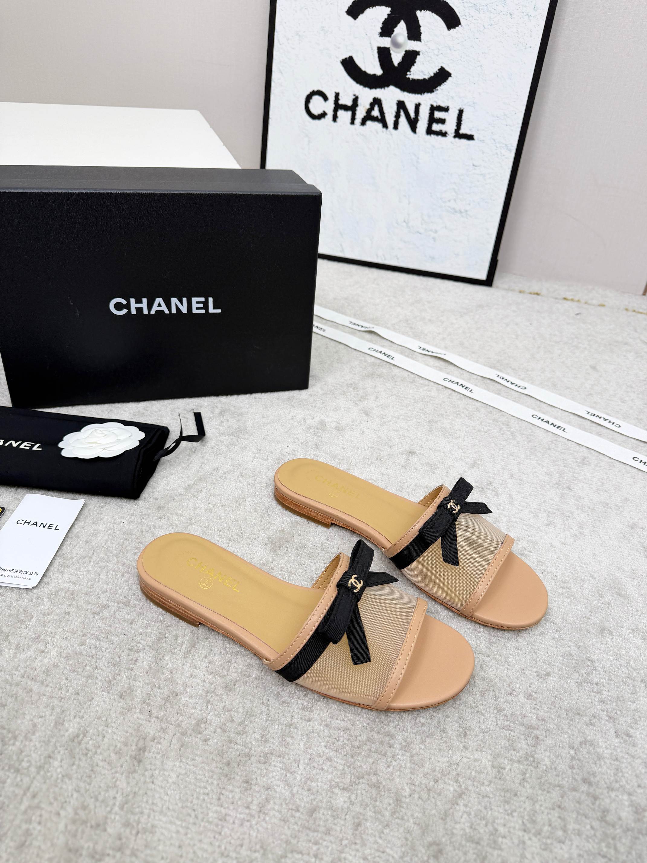 CHANEL 26S SLIDE SANDALS IN BEIGE MESH AND CALFSKIN WITH BLACK RIBBON