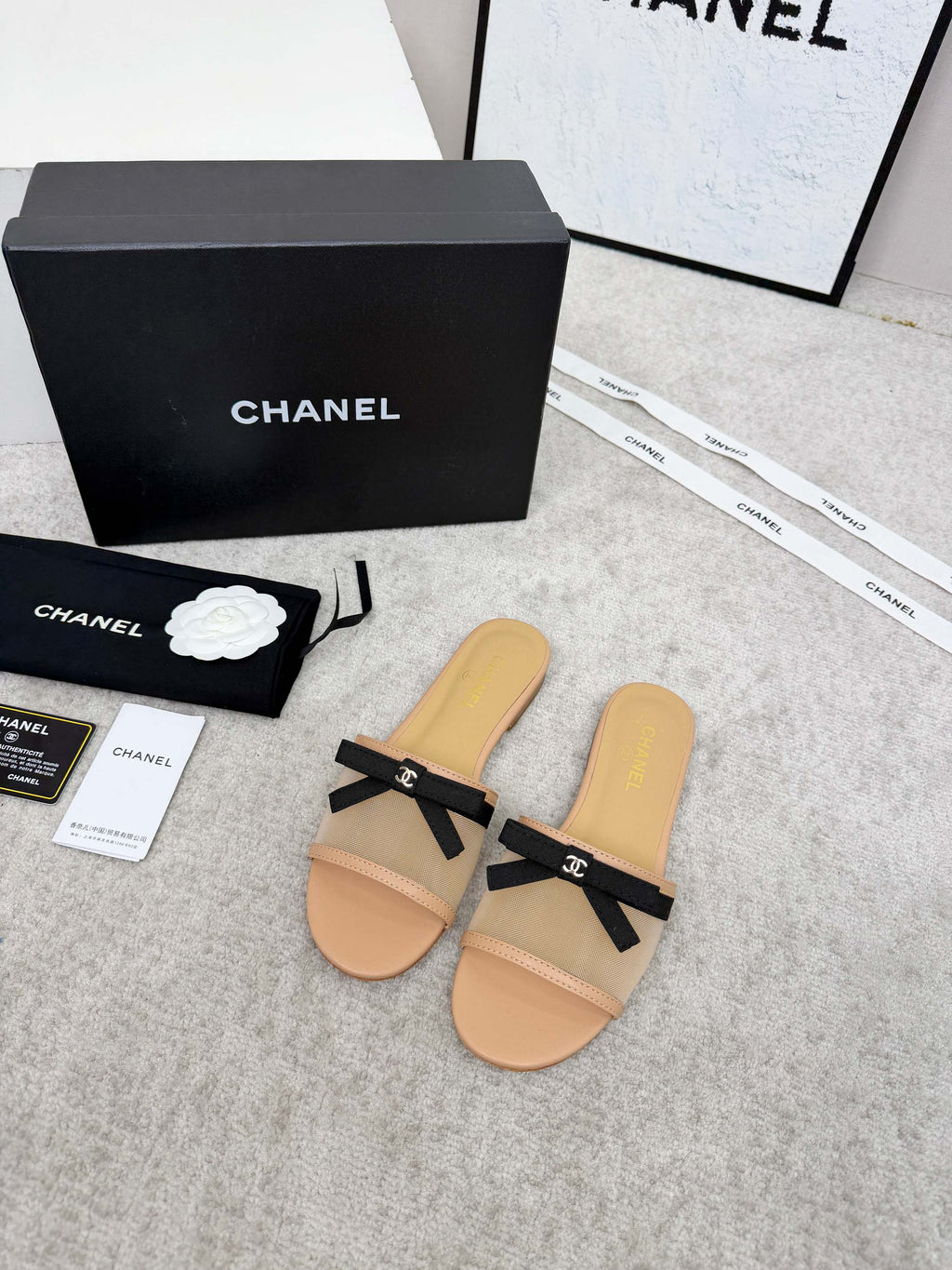 CHANEL 26S SLIDE SANDALS IN BEIGE MESH AND CALFSKIN WITH BLACK RIBBON