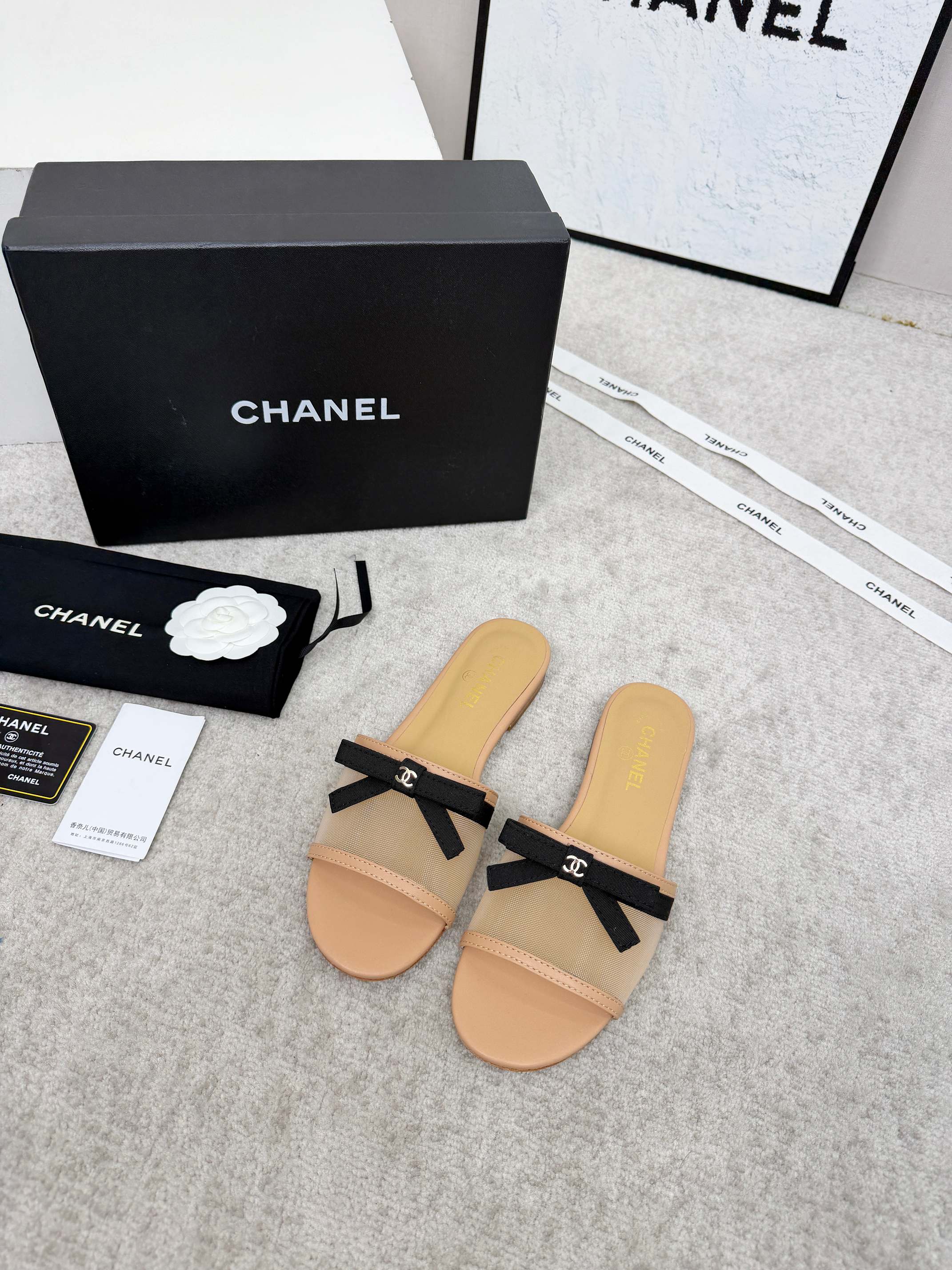 CHANEL 26S SLIDE SANDALS IN BEIGE MESH AND CALFSKIN WITH BLACK RIBBON