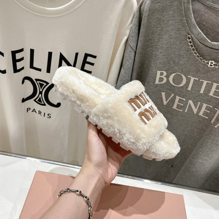 MIUMIU 26S FLAT SLIDES IN CREAM BEIGE SHEARLING