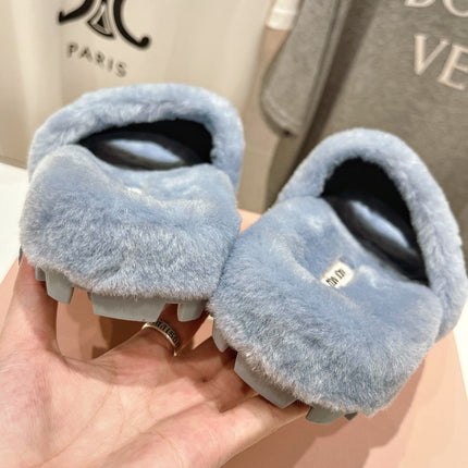 MIUMIU 26S FLAT SLIDES IN PASTEL BLUE SHEARLING