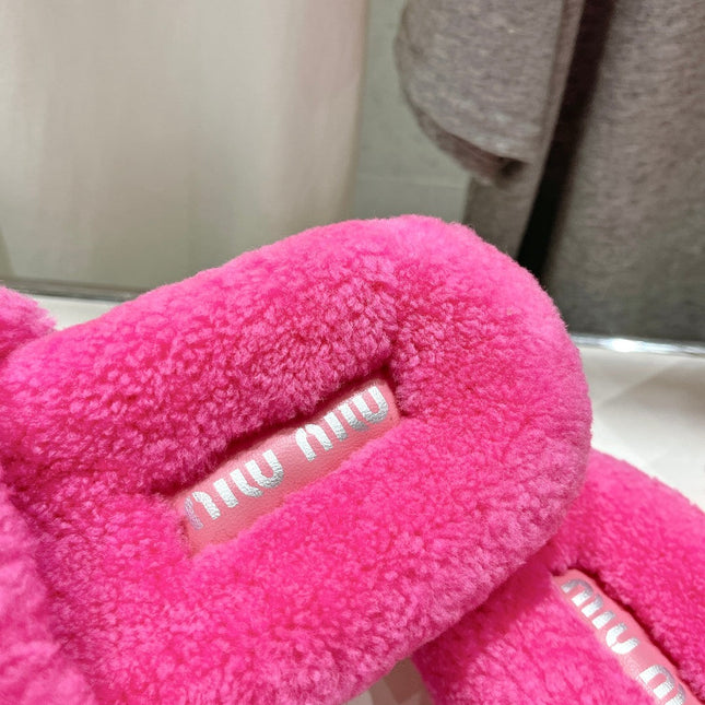 MIUMIU 26S SANDALS IN PINK SHEARLING WITH LOGO LETTERING